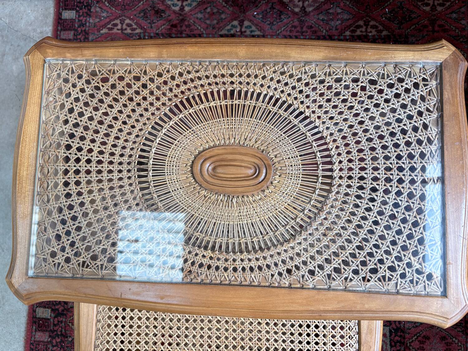 Vintage nesting tables in wood and cane – perfect condition.
