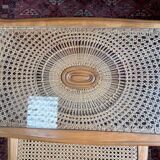 Vintage nesting tables in wood and cane – perfect condition.