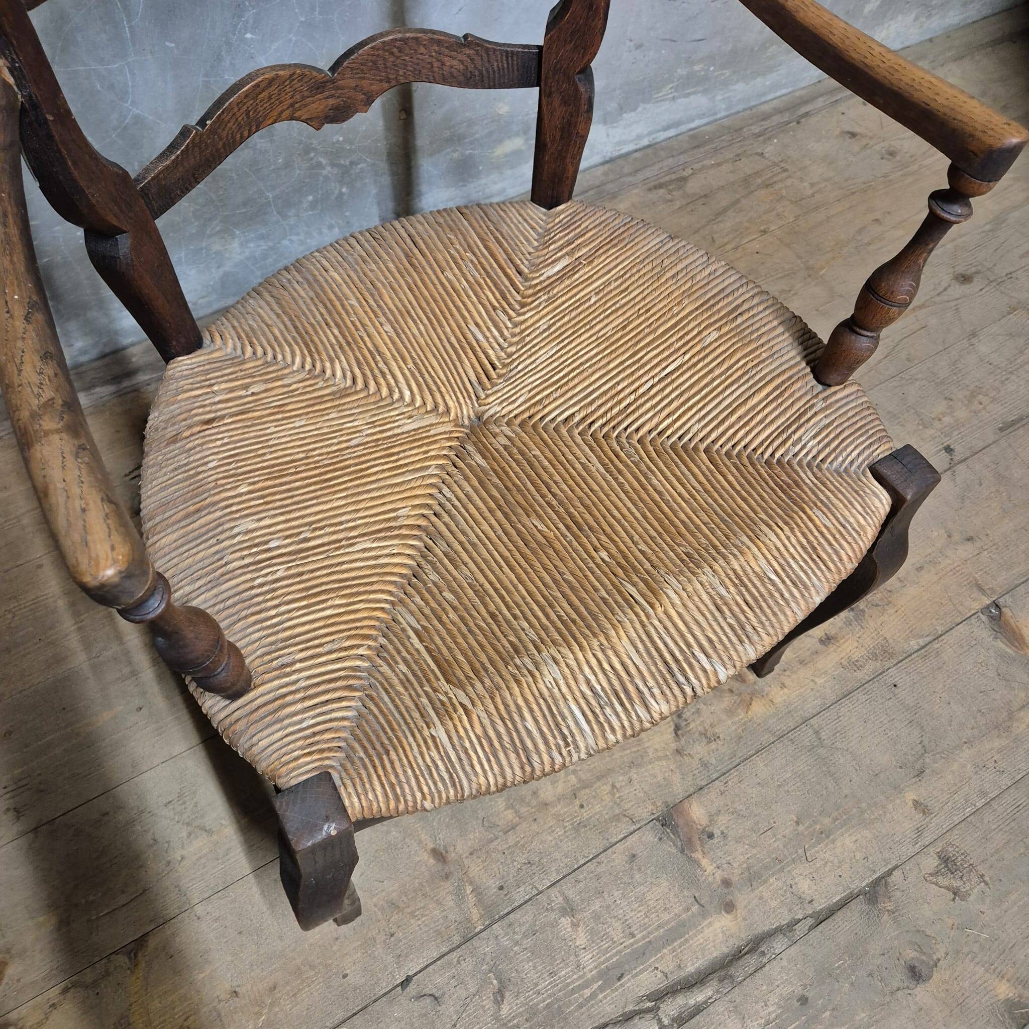 French provincial oak armchair with woven seat, early 20th century, France