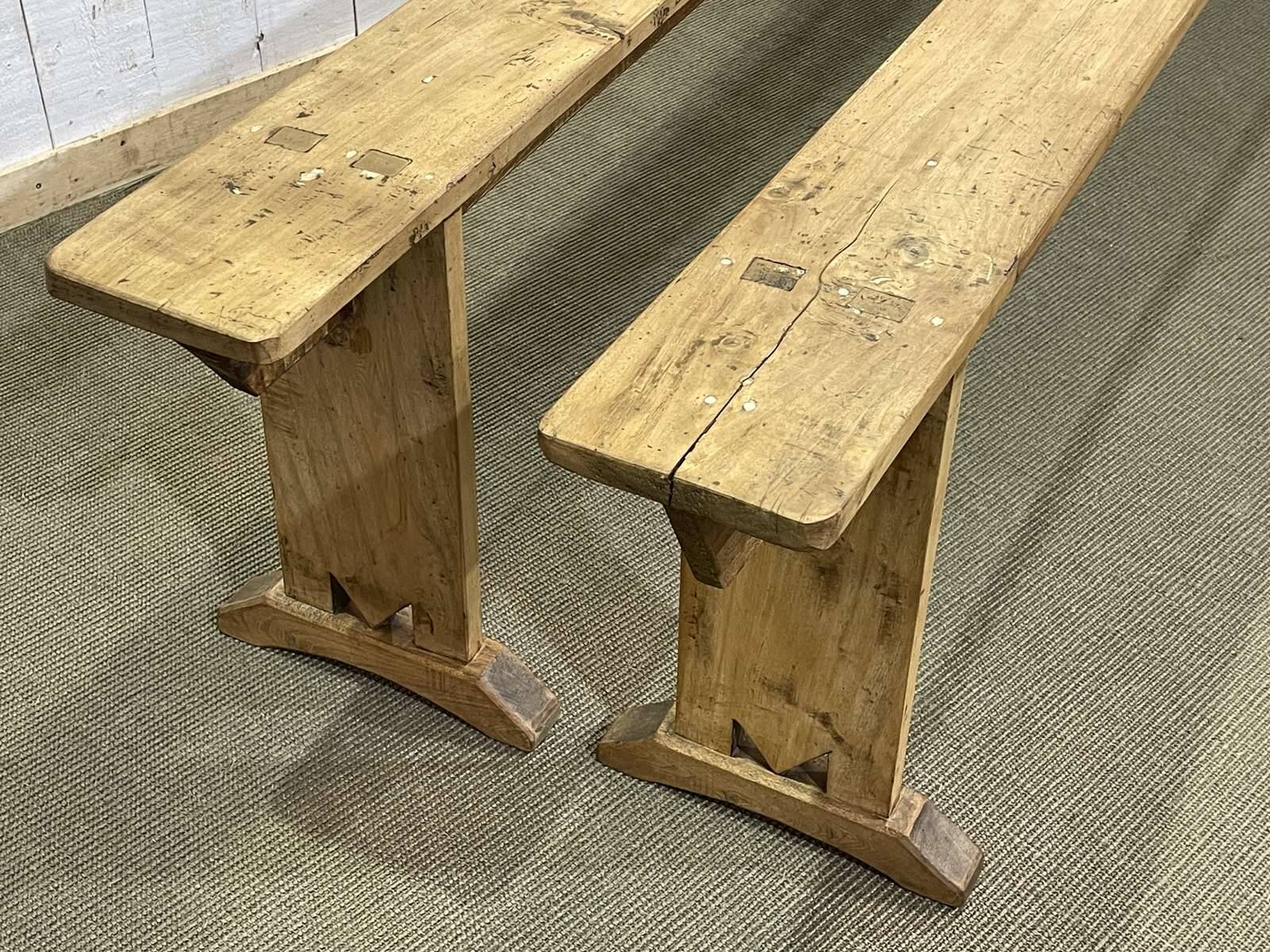 Pair of farmhouse table benches in poplar from the early 20th century.