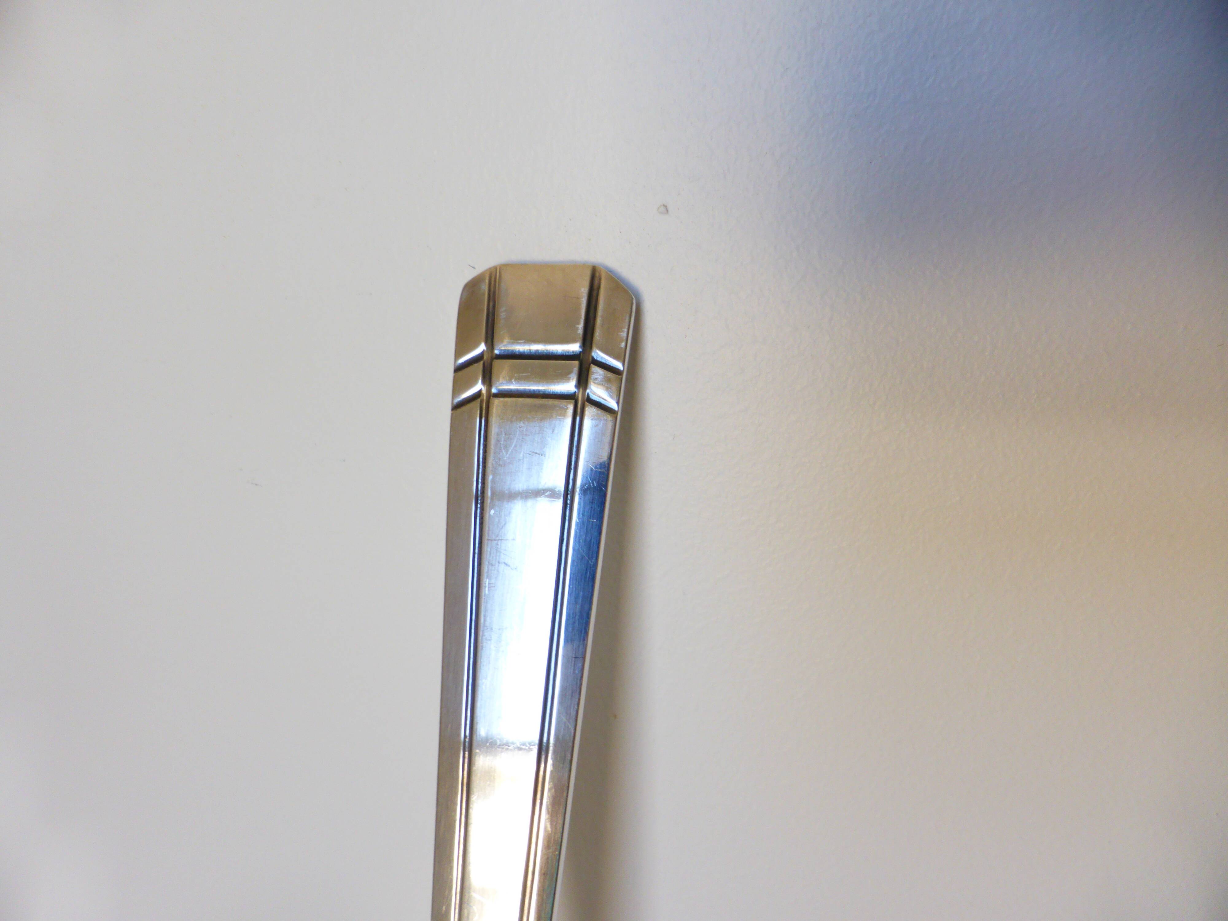 Shabby vintage silver-plated ladle.