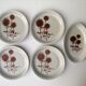 Set of 4 dessert plates and 1 “Thistle” bowl