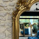 Gold leaf mirror with pediments, 219/131cm, overmantel.