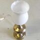 Table lamp in gilded brass and opaline globe - mid 20th century.