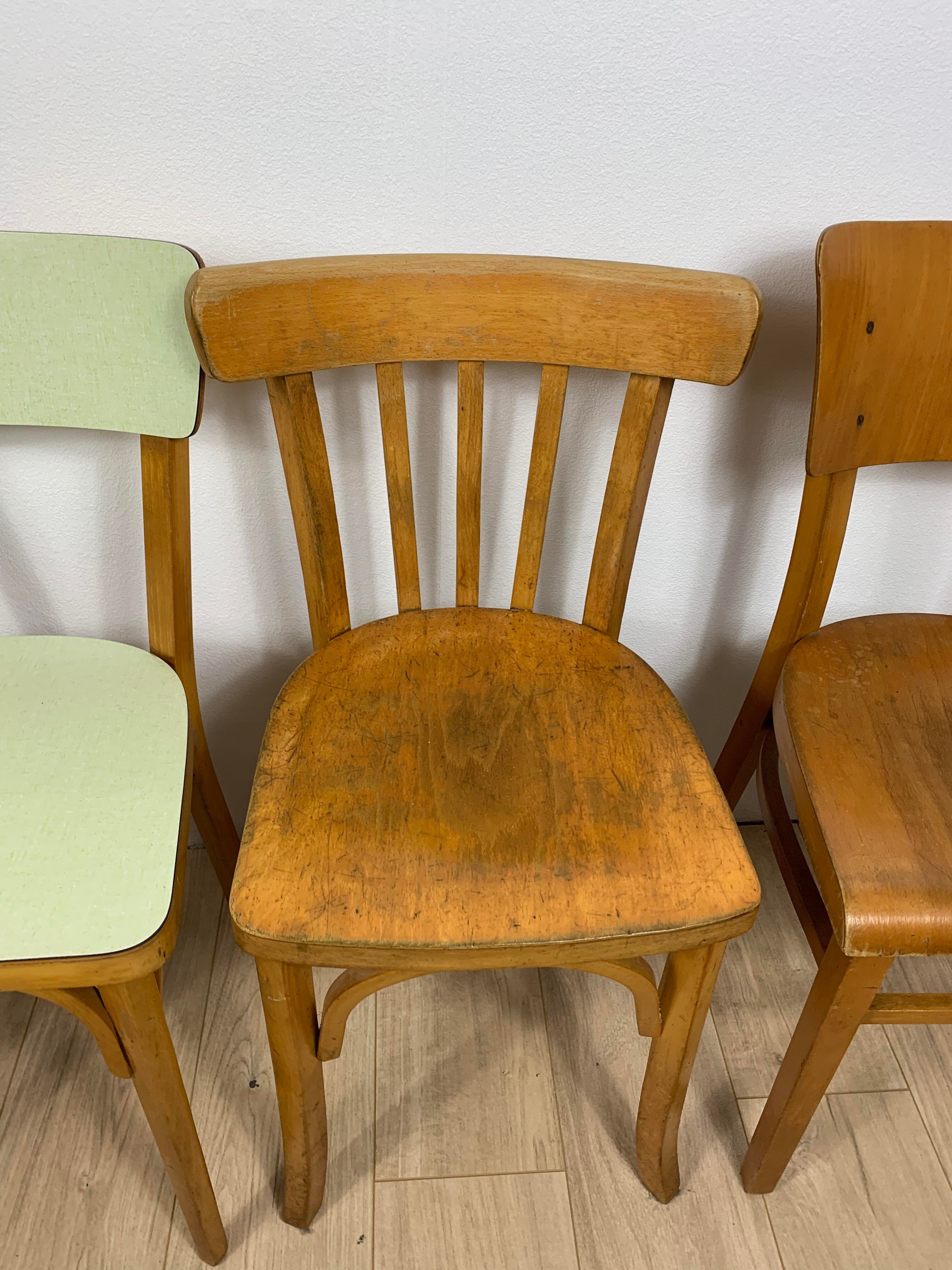 4 mismatched bistro chairs
