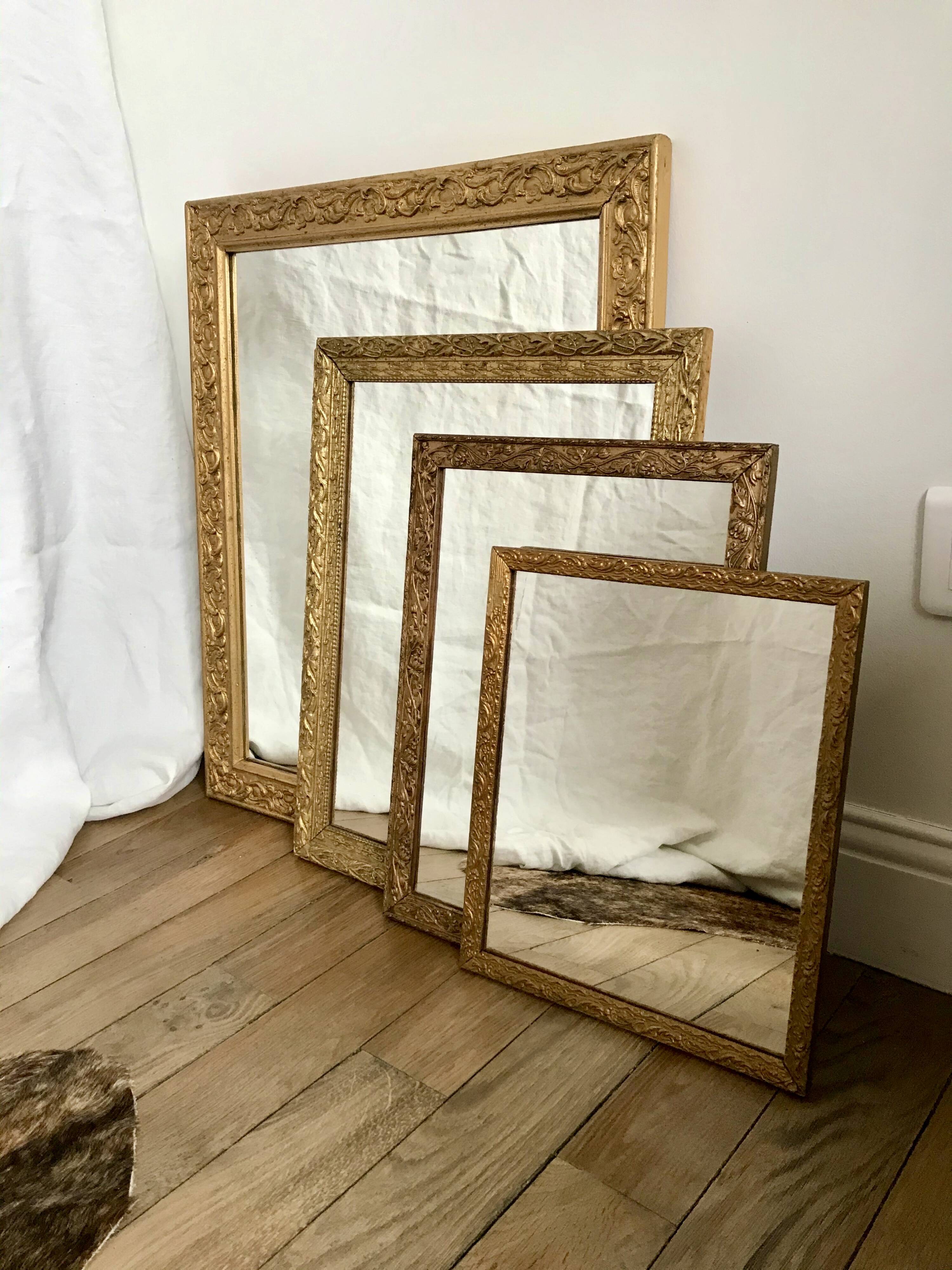 wooden and gilded stucco mirror early 20th century