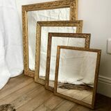 Miroir en bois et stuc doré début XXème