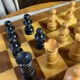 Chess set with wooden board and pieces