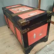 Red lacquered wooden mallet from the Far East.