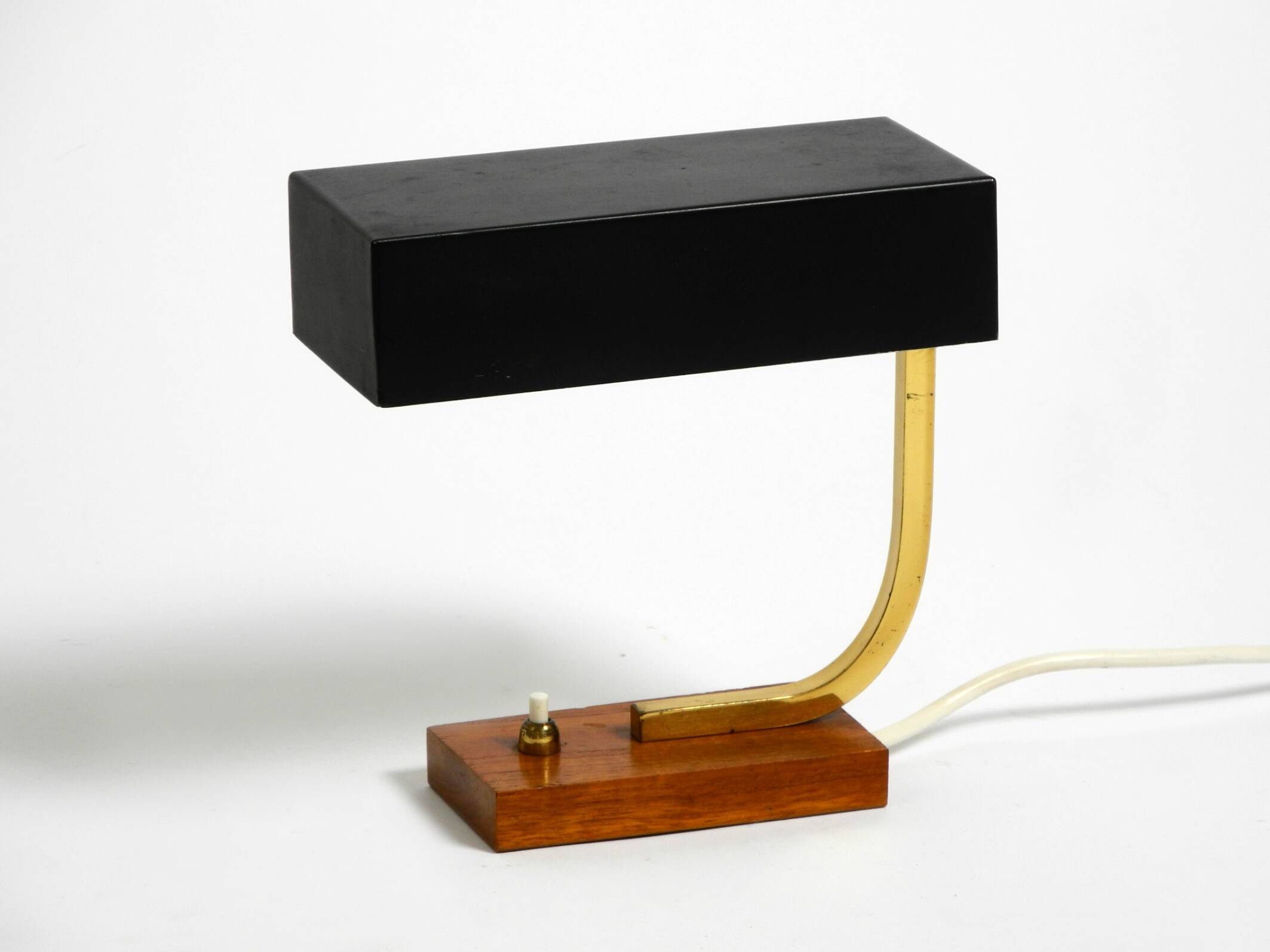 Beautiful small Mid Century Modern metal and brass table lamp with teak bas