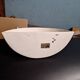 Yellow stoneware half-moon wall light