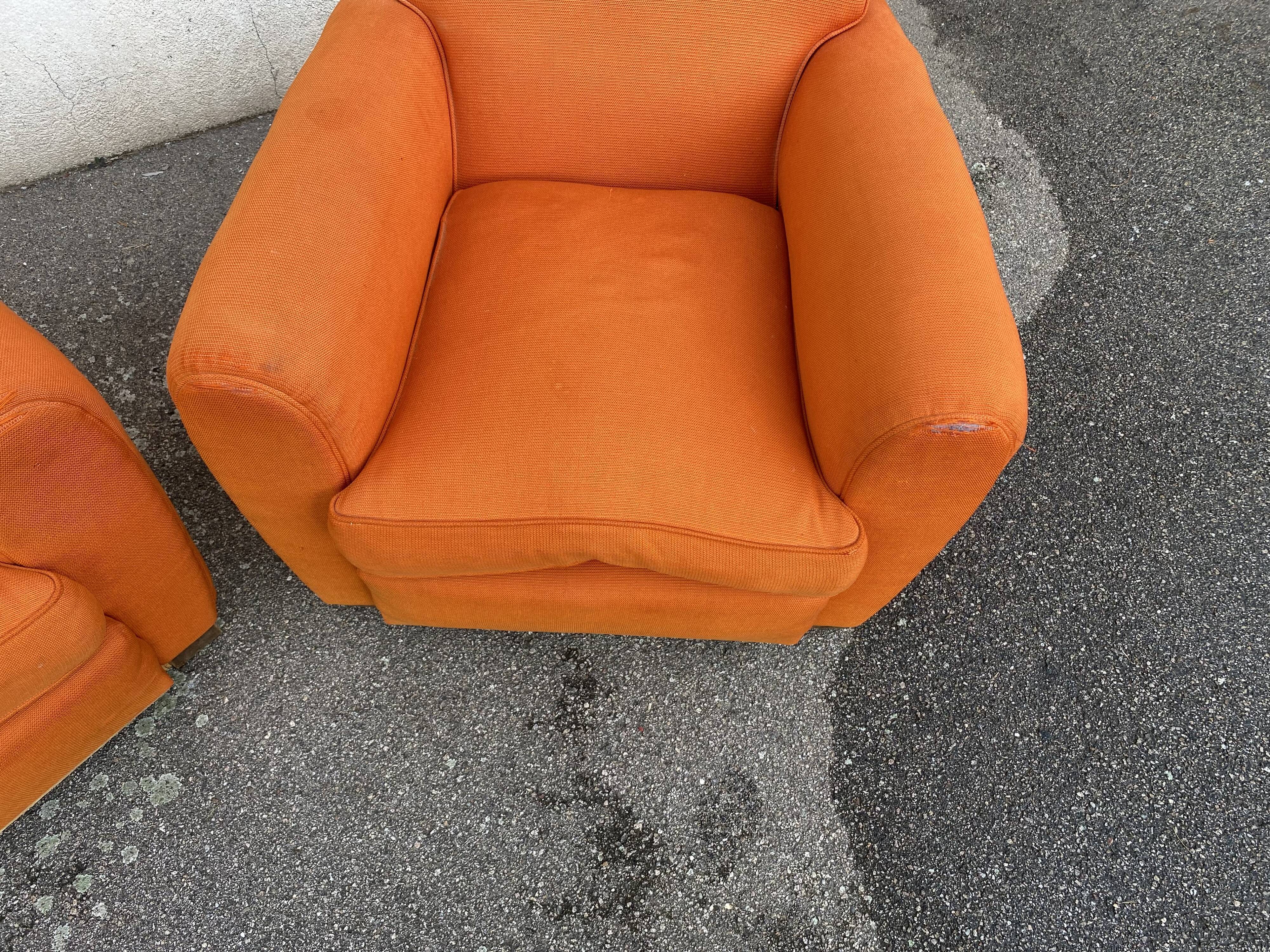 Pair of vintage orange club chairs