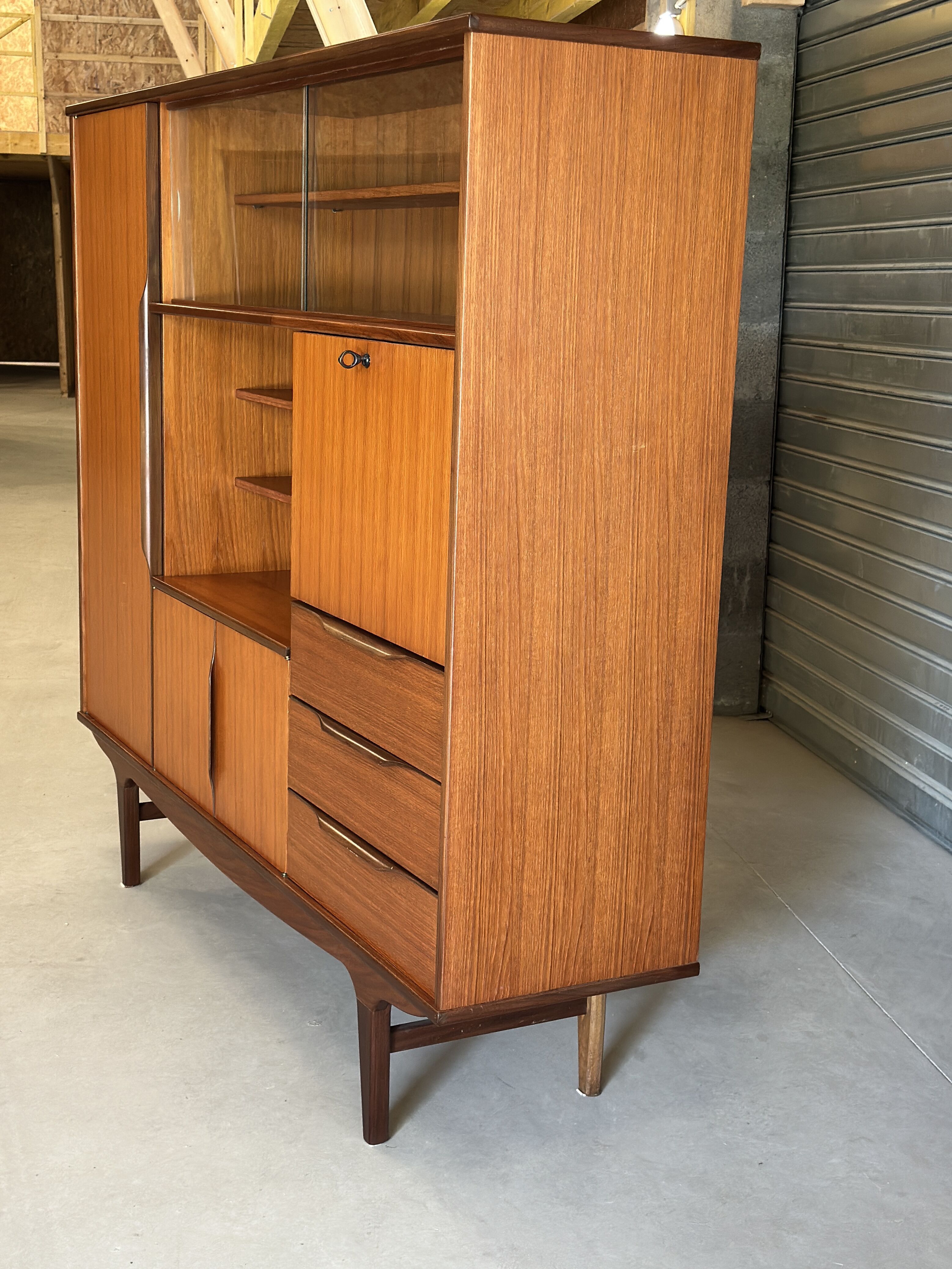 Very beautiful Scandinavian highboard in teak from the 1960s.