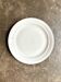 Round plate in white and gold porcelain