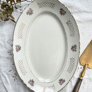 Plat oval vintage en faïence fleurie moulin des loups modèle "cordoue"