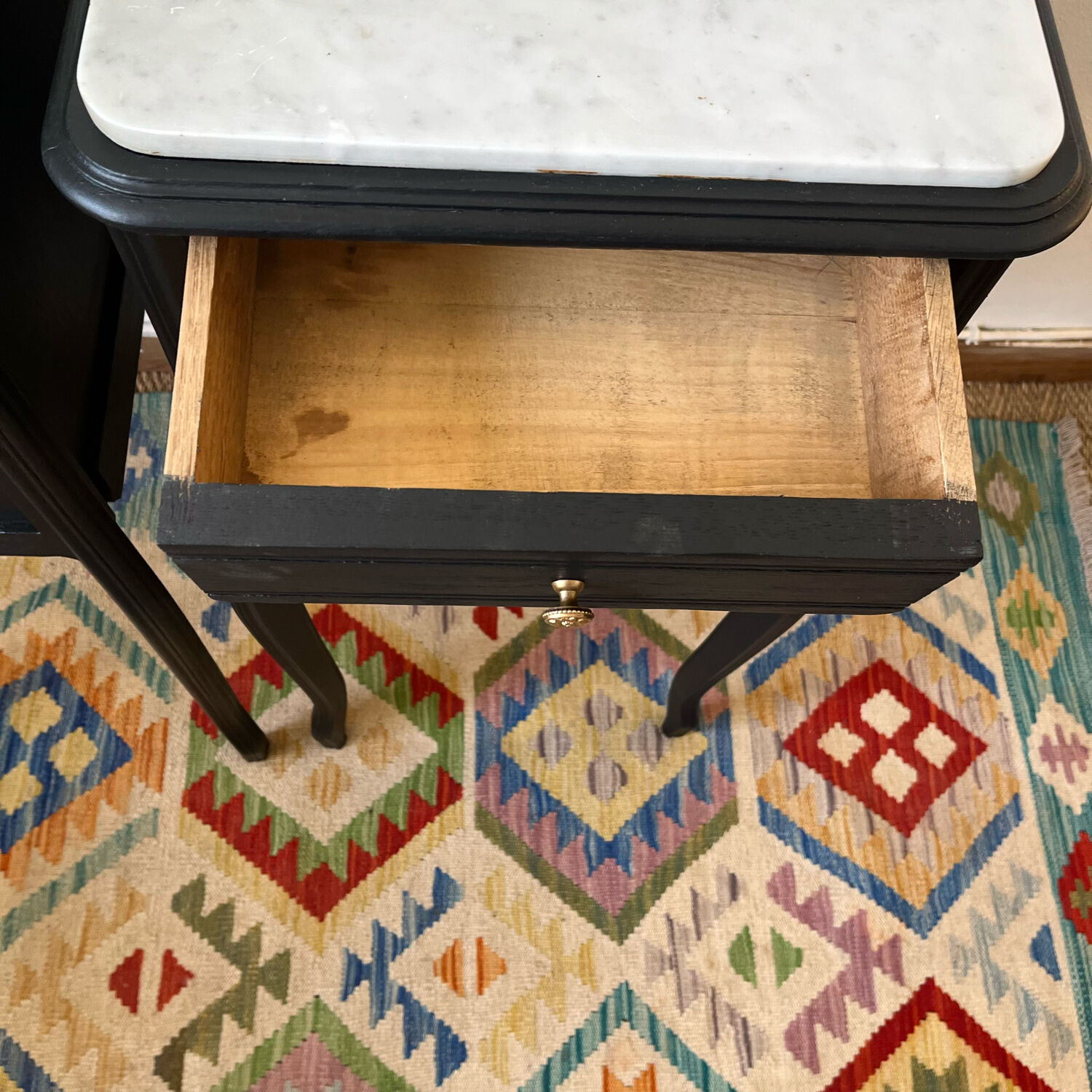 Pair of marble and wood bedside curved feet