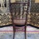 Suite de 8 chaises de bistrot en cannage FISCHEL
