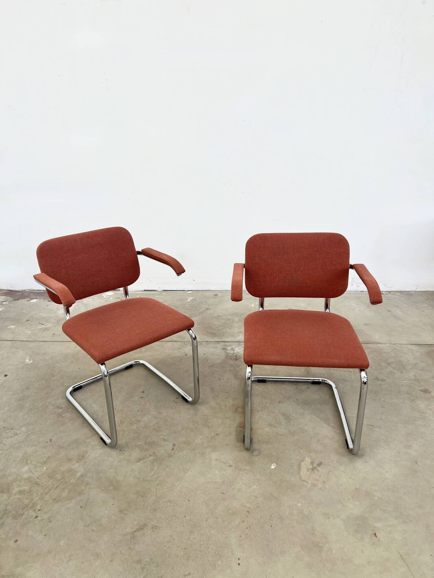 Pair of Marcel Breuer B64 Knoll armchairs in coral fabric