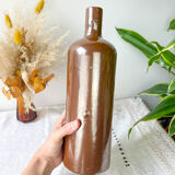 Vintage iridescent brown stoneware bottle
