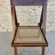 Chaise pliante en bois avec assise cannée
