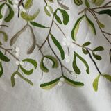 Hand-embroidered tablecloth on rectangular thread canvas
