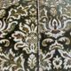Vintage baroque chair with a rich floral pattern