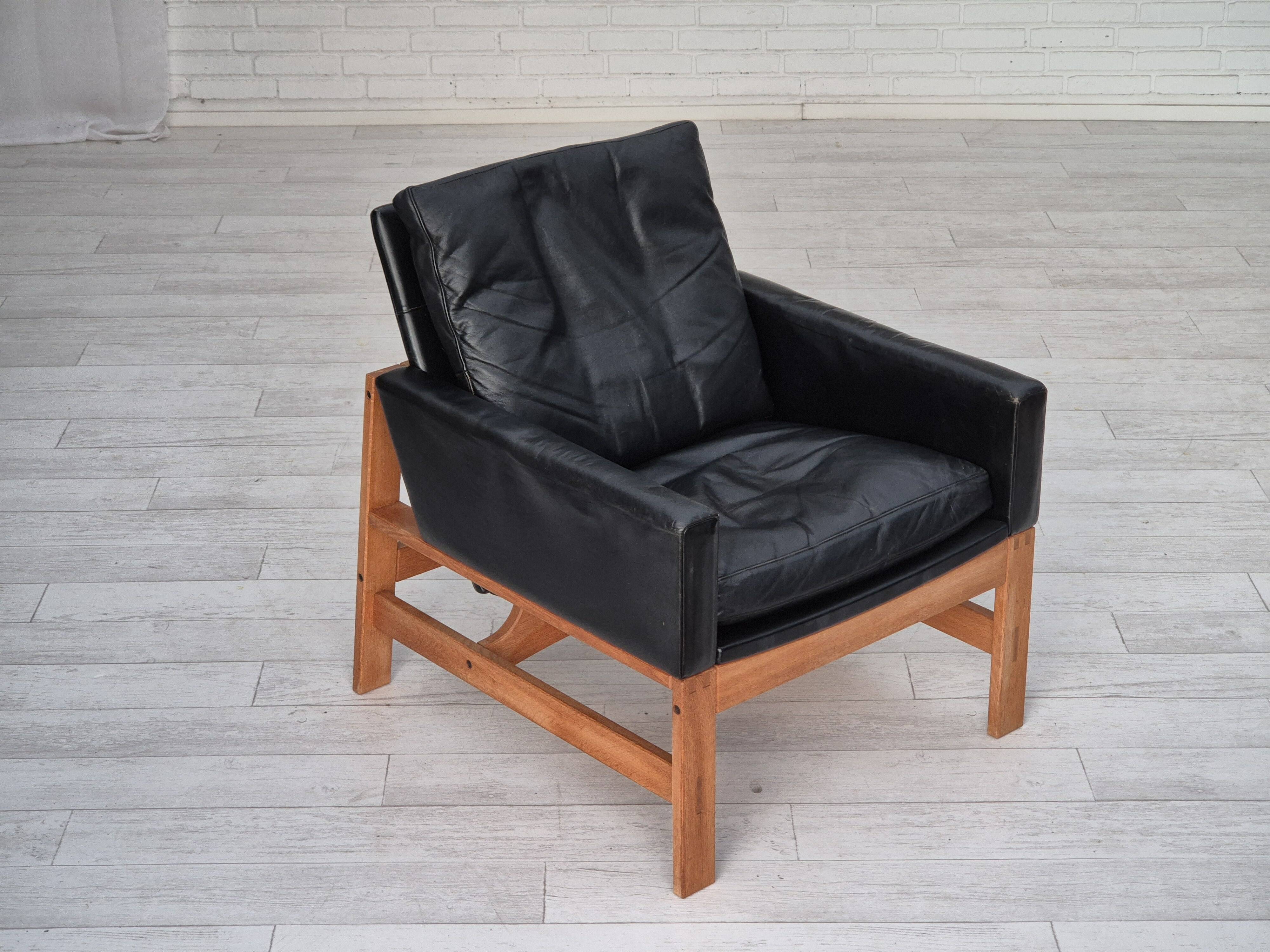 1960s, Danish lounge chair, original condition, furniture leather, solid oak wood.