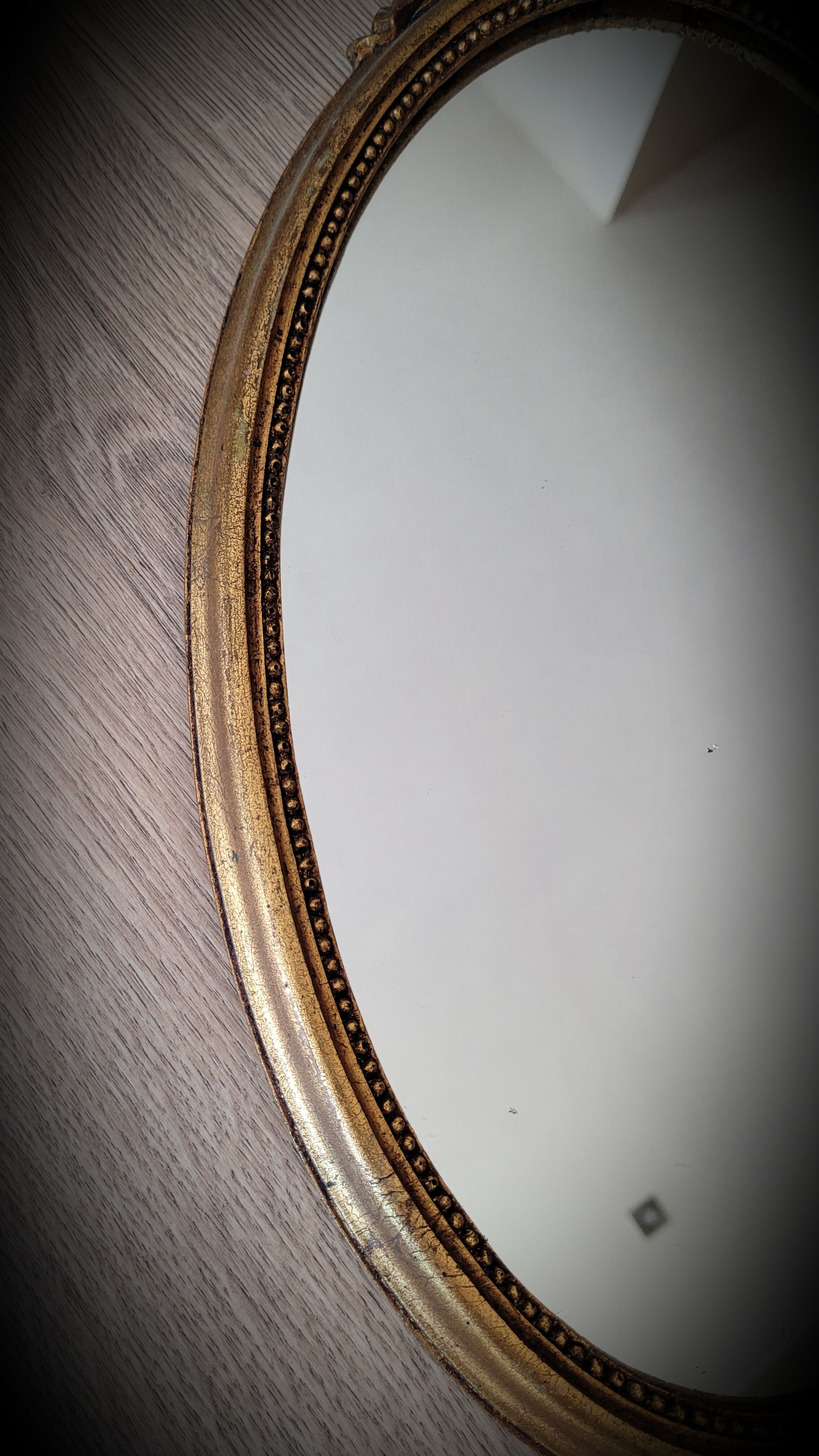 Oval golden mirror 41x23