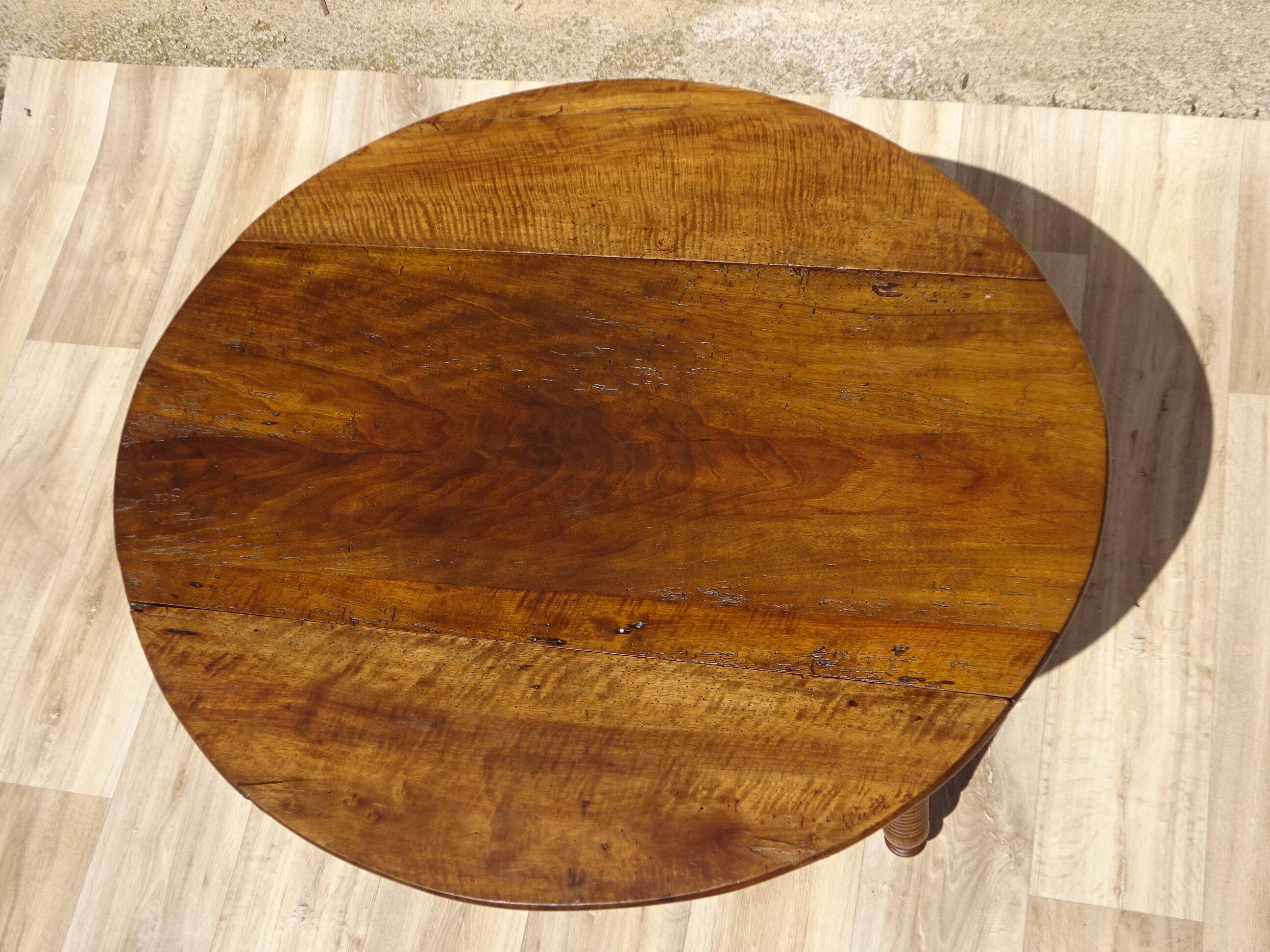 Antique walnut console table with honey spoon legs.