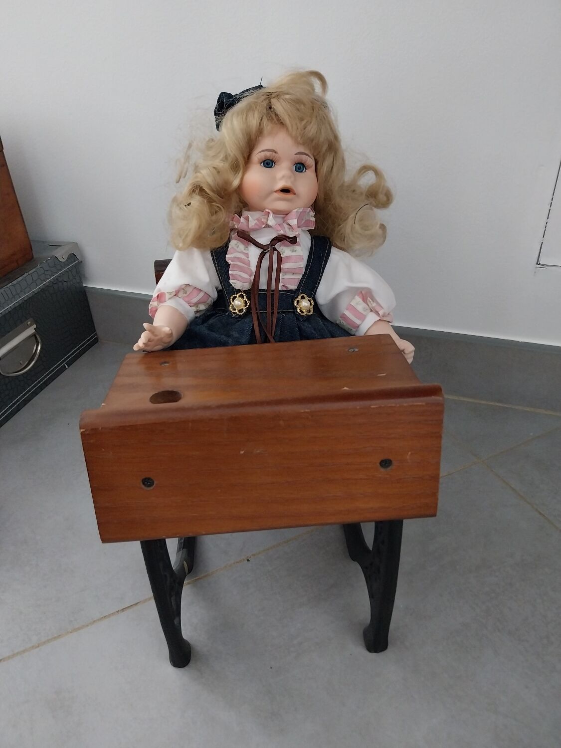 Wooden swing desk and porcelain dolls