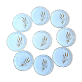 Huit assiettes à dessert motif champêtre
