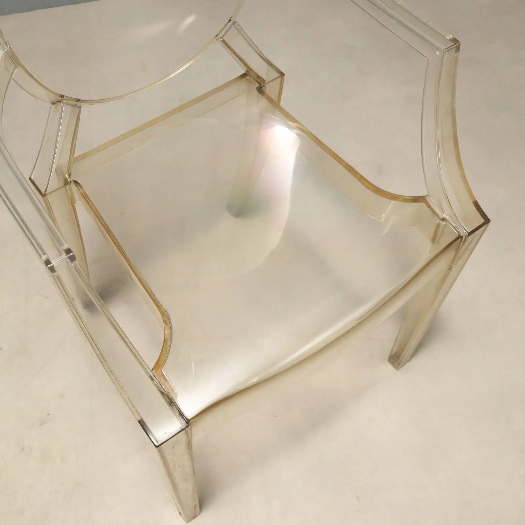Louis Ghost chairs by Kartell designed by Philippe Starck from the 2000s.
