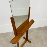 Beveled mirror on oak stand 40s