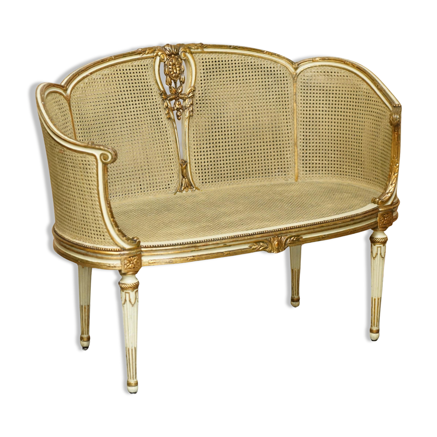 Louis XVI Bergère canapé in gilded wood with double caning