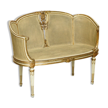 Louis XVI Bergère canapé in gilded wood with double caning