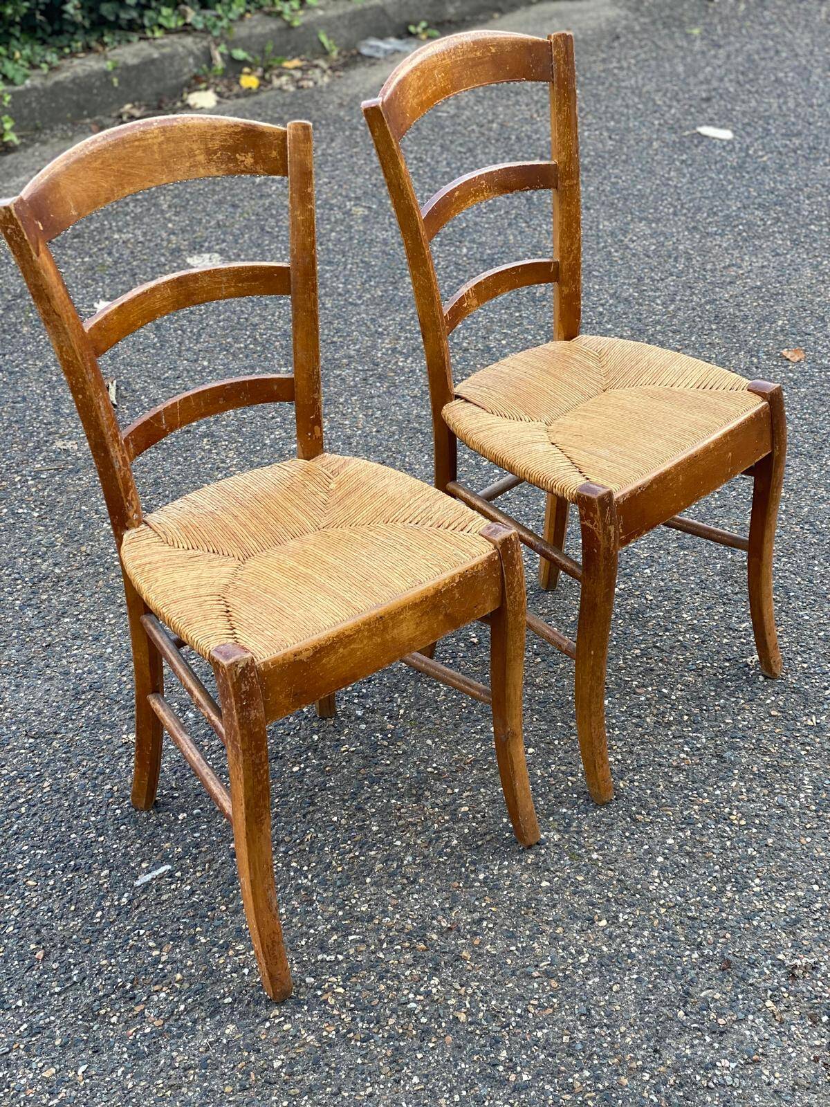 2 solid wood and straw dining chairs