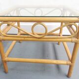 Table basse en rotin et plateau en verre