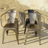 Four stackable chairs with industrial style