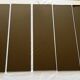 Brushed gold aluminium shelf and smoked glass from the 1970s.