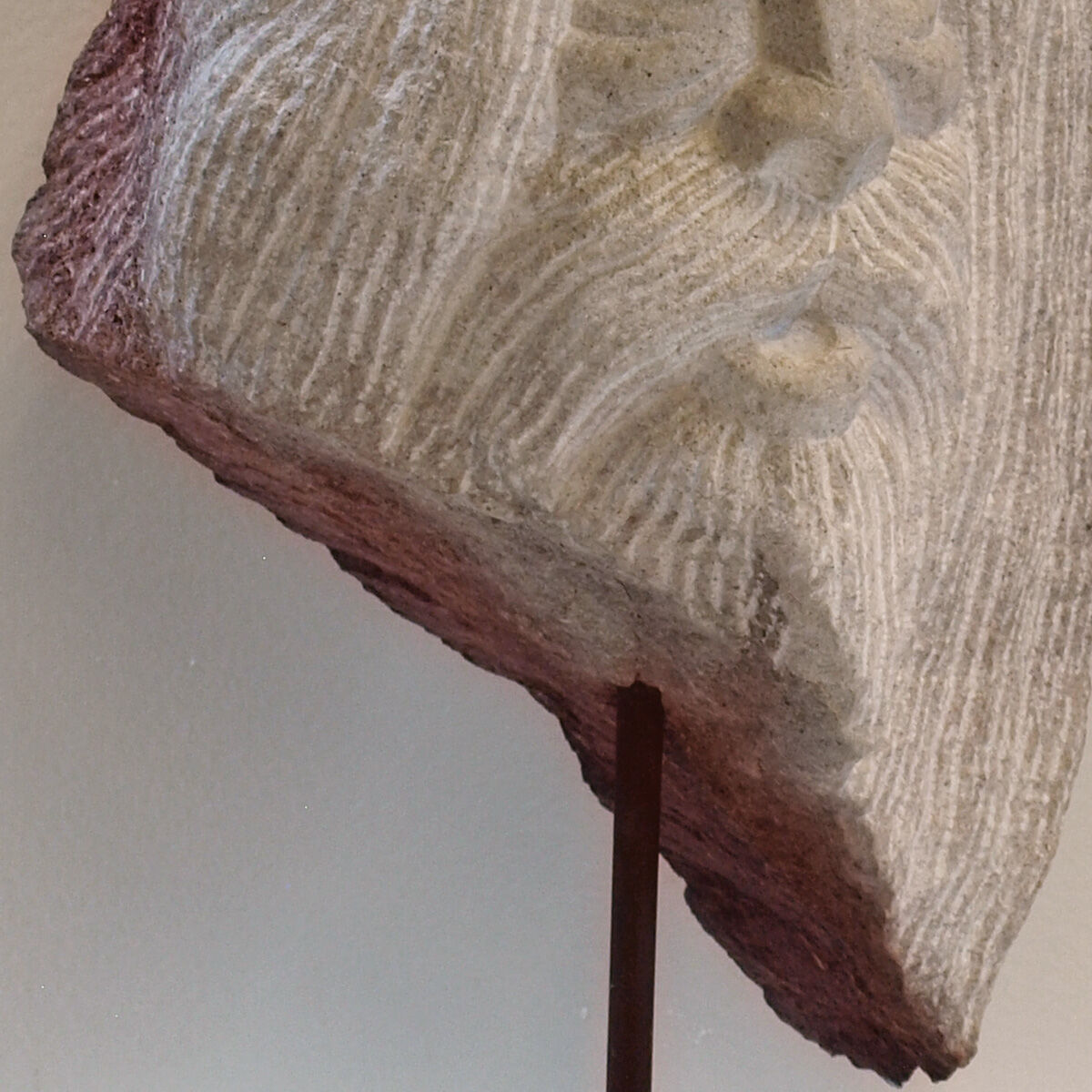 Carved stone head sculpture