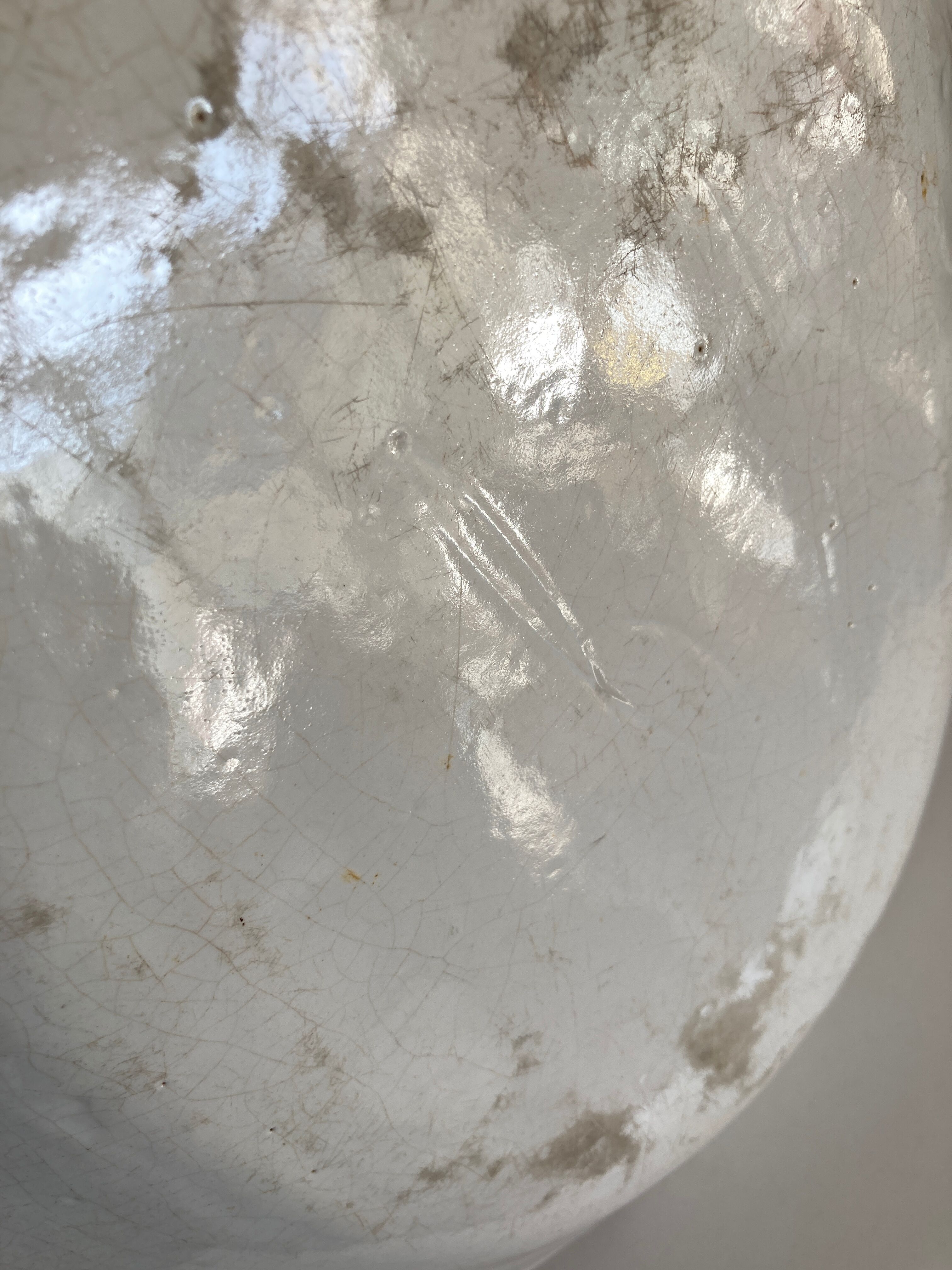 19th-day polished earth dish with godrons