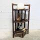 Rattan corner shelf