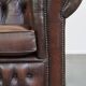 Beautiful and spacious dark brown mottled English cow leather Chesterfield armchair