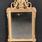 Louis XVI style mirror in gilded wood