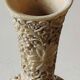 Asian-inspired ball vase. In beige cinnabar lacquer. Scenes of life decor. Arabesque and floral friezes. Height 24 cm