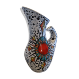 Granite ceramic pitcher and heart symbol