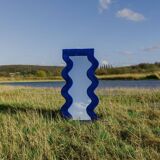 Klein wavy mirror
