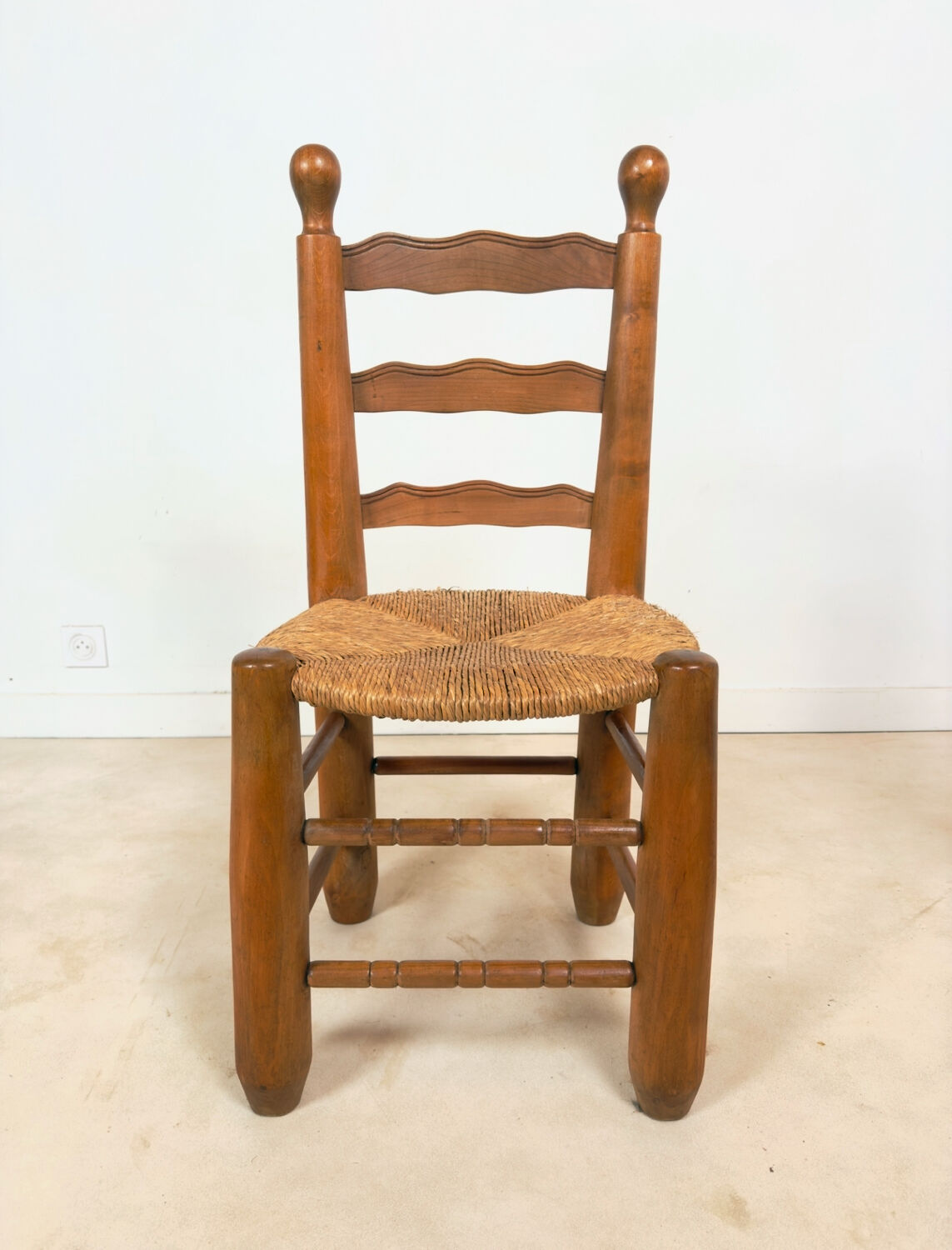 Vintage wooden chair with rush seating