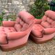 Pair of pink tufted velvet frog chairs from the 1970s.
