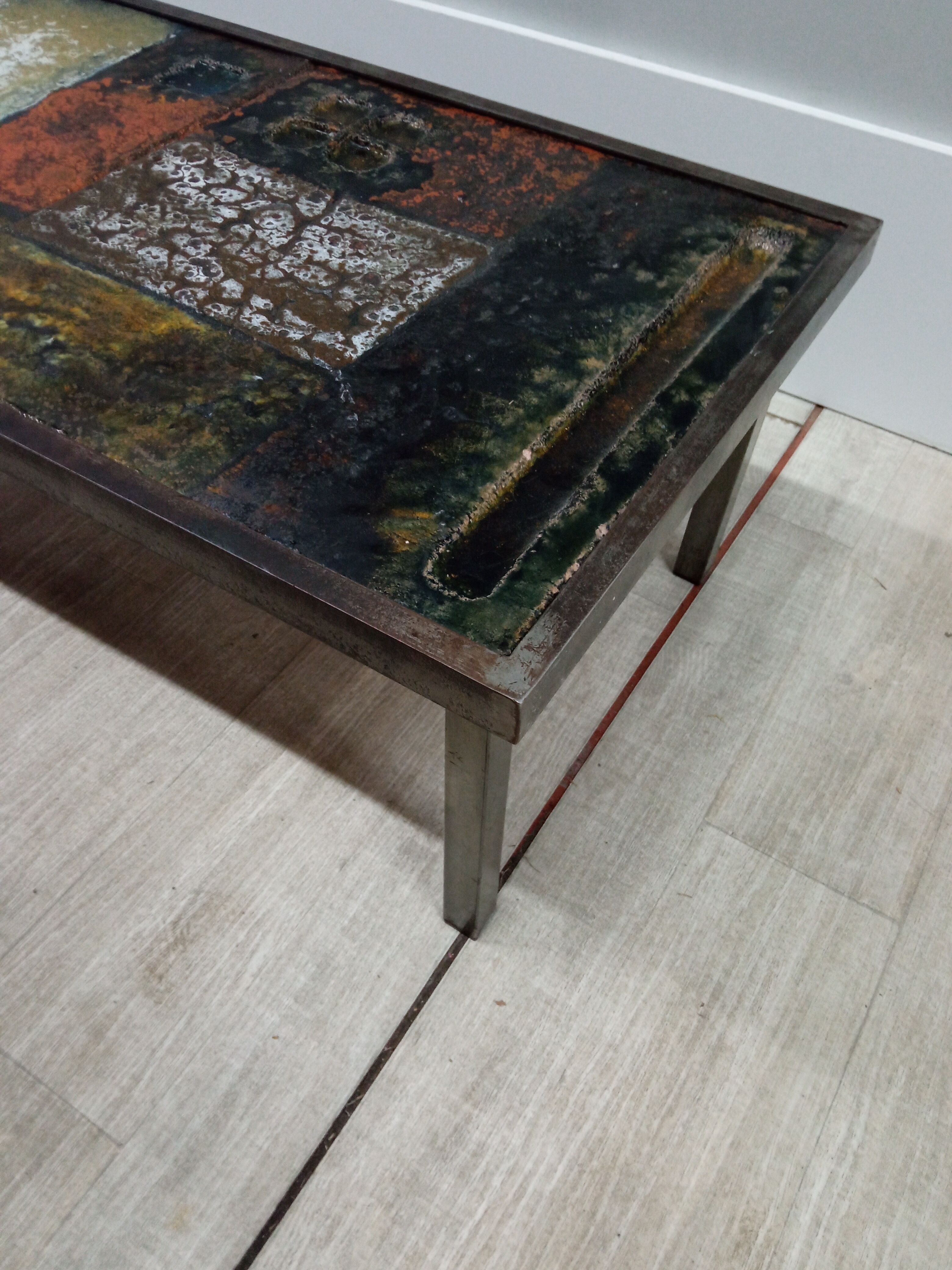 Coffee table in enamelled lava stone